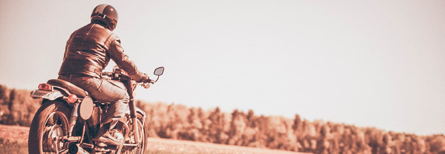 Person on classic motorbike