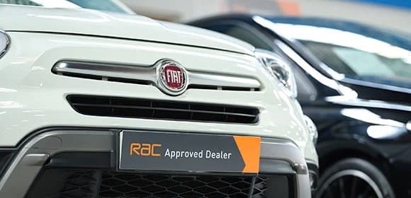 Close up of the front of a Fiat 500 car