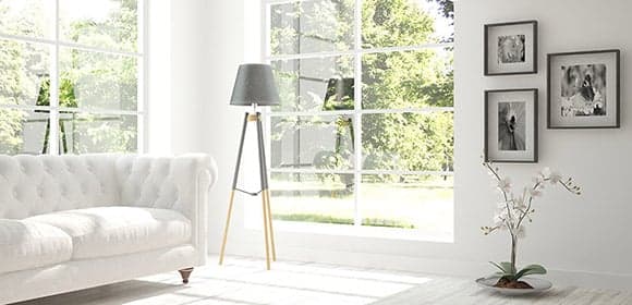modern, white living room with large windows
