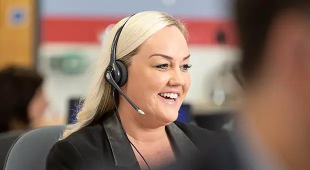 RAC call centre colleague wearing a headset
