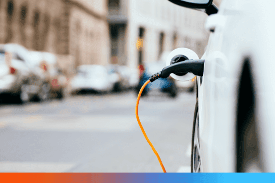 EV car plugged in to charge