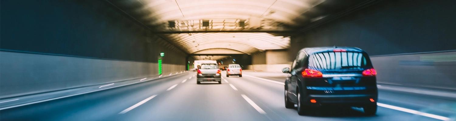 Cars driving on a motorway in a tunnel