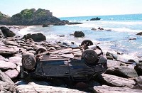 Man survives 200ft car cliff plunge