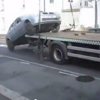 Driver 'reclaims' car off tow truck