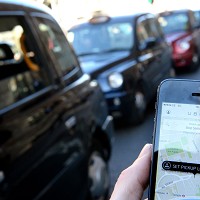 Cabbies block London in Uber row