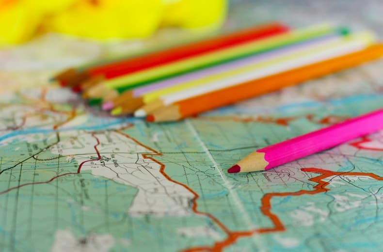crayons and map