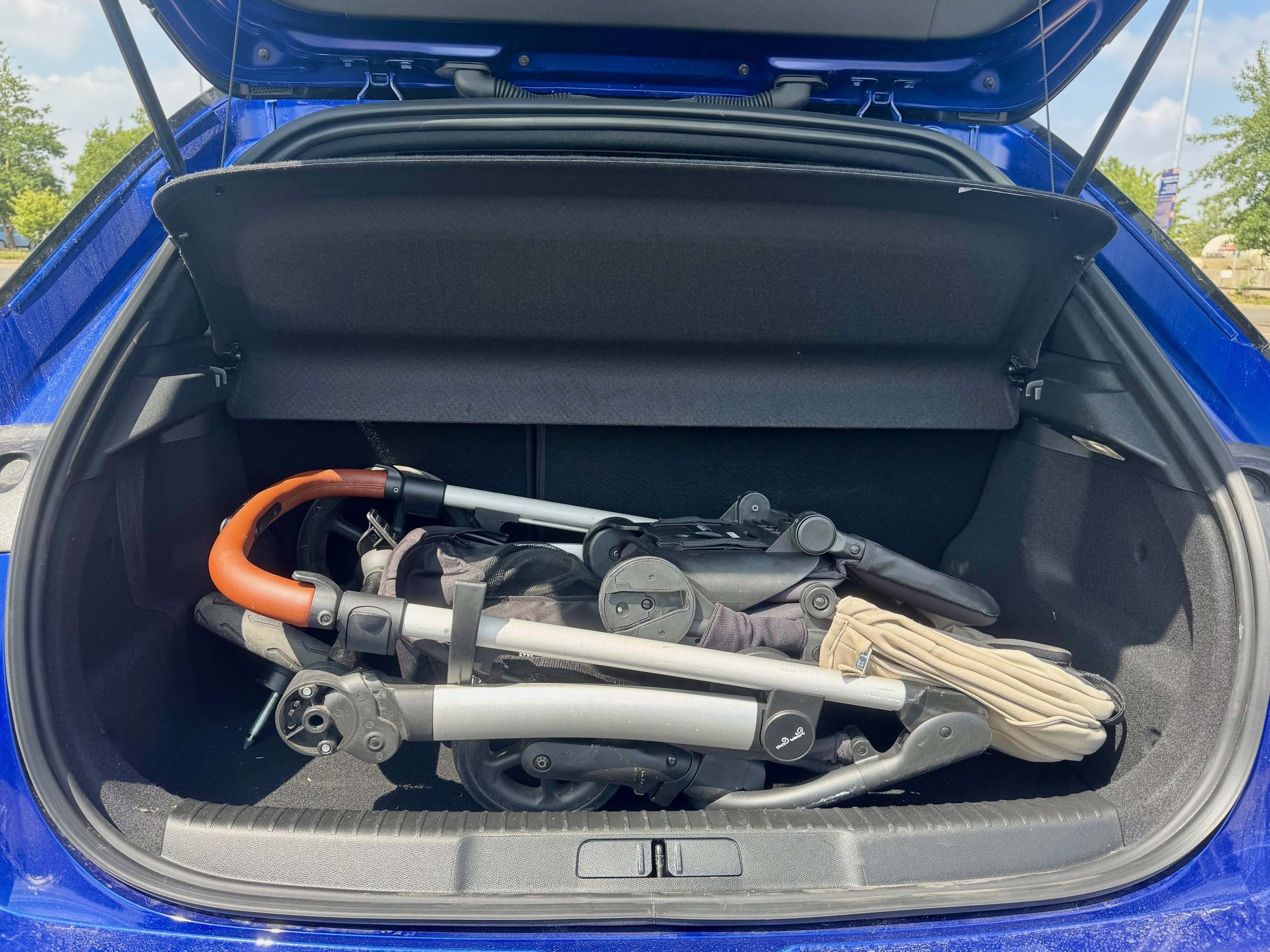 Child pushchair in the boot of Vauxhall Mokka Electric
