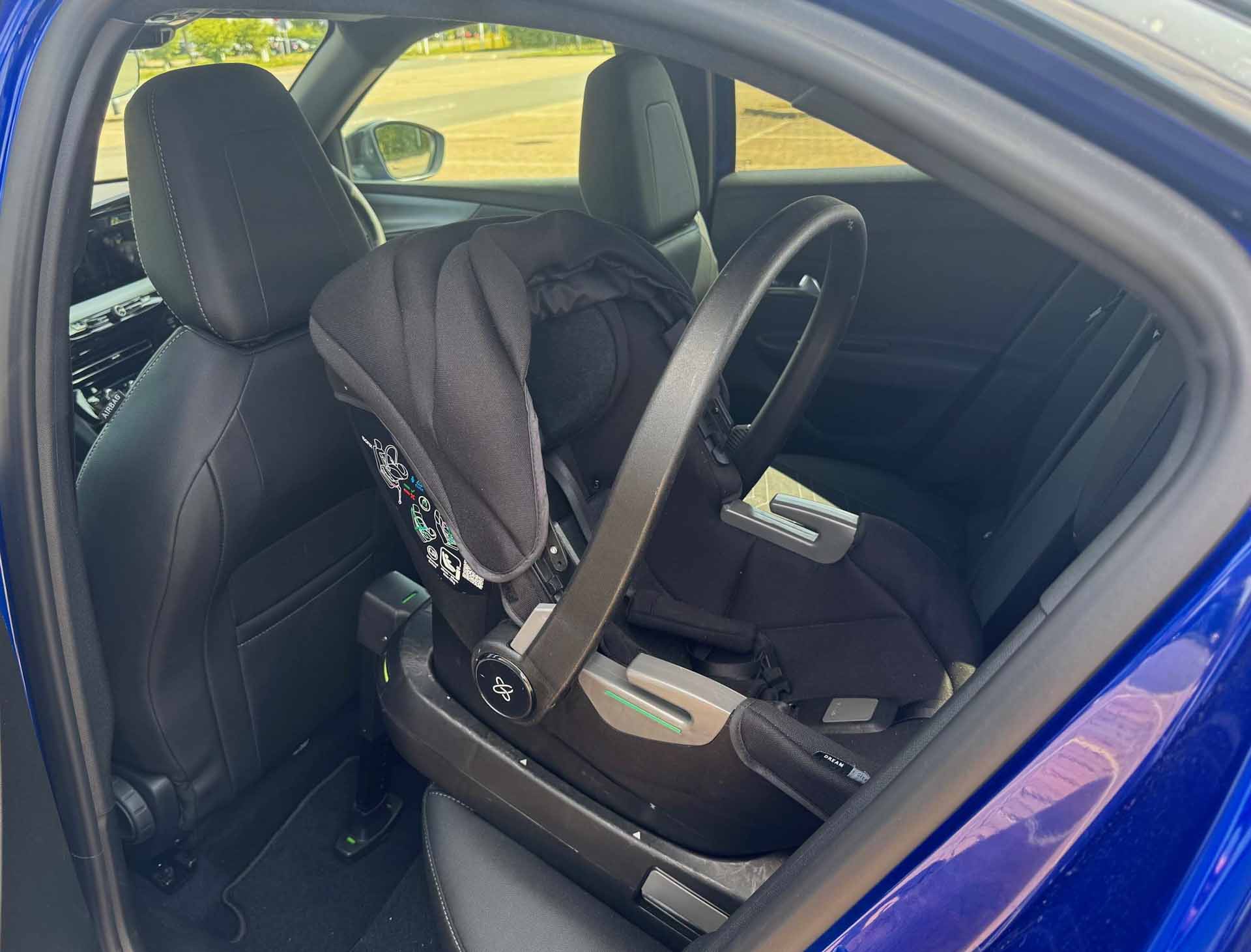 Baby seat in back of Vauxhall Mokka Electric blue