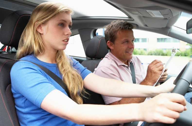 driving instructor and student in car