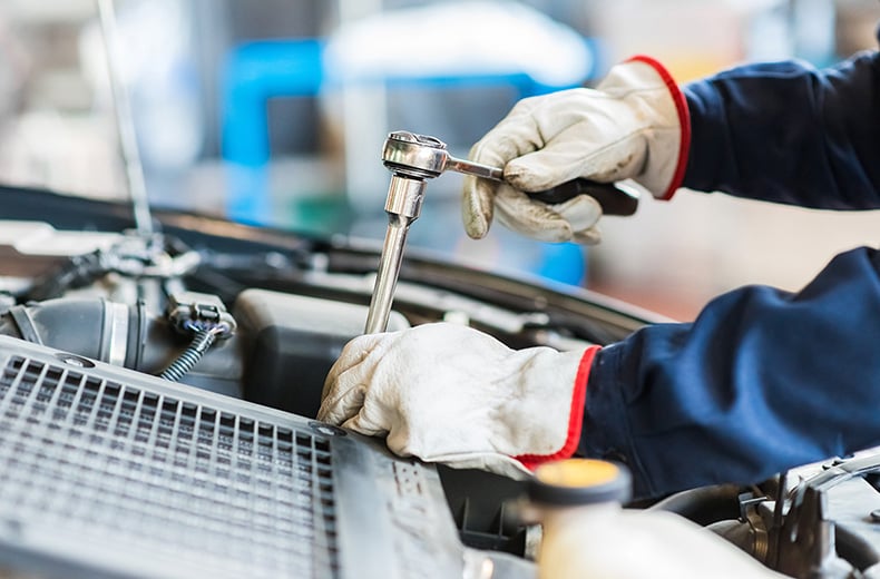 mot mechanic working with a spanner