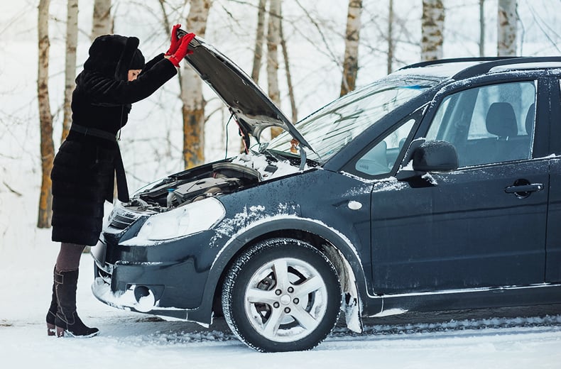 women opening car bonnet