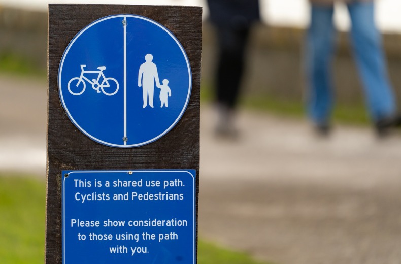 Share the Road with Bikes and Pedestrians Sign