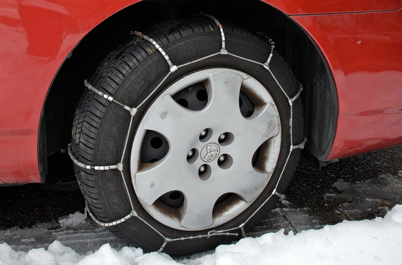 Fitting snow chains