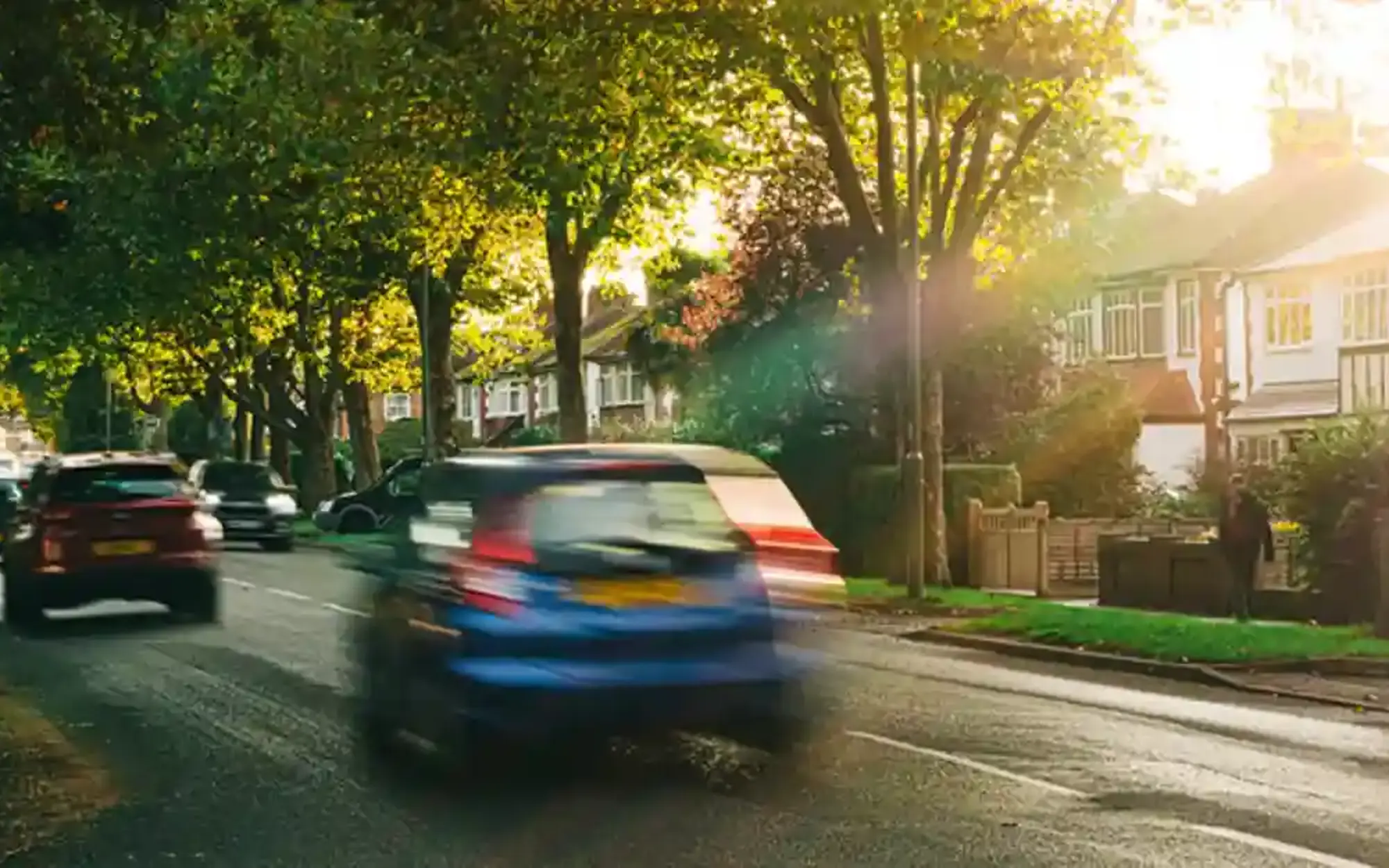 Cars driving in sunlight